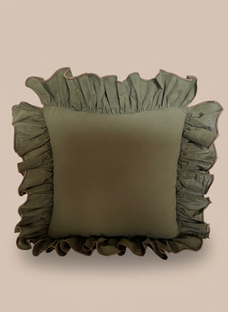Green 22x22 throw pillow ruffled edges on a beige background